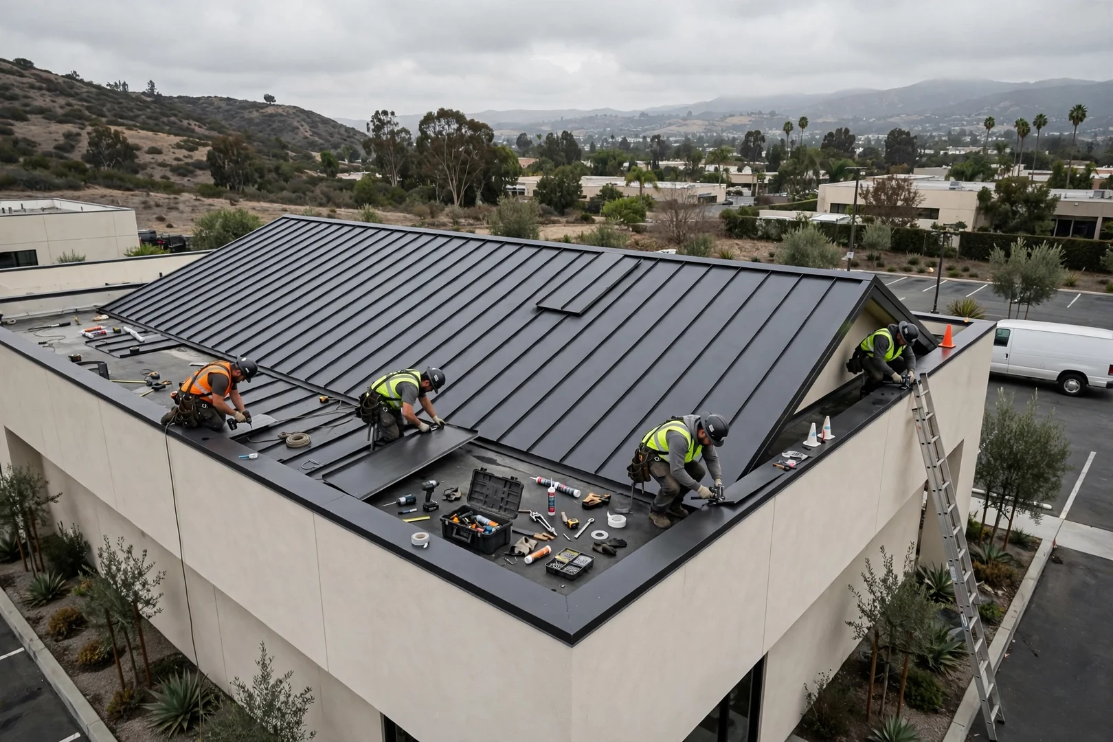 New standing seam metal panels installed on a small commercial building roof